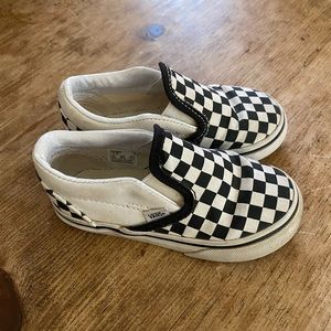 Checkerboard slip on vans